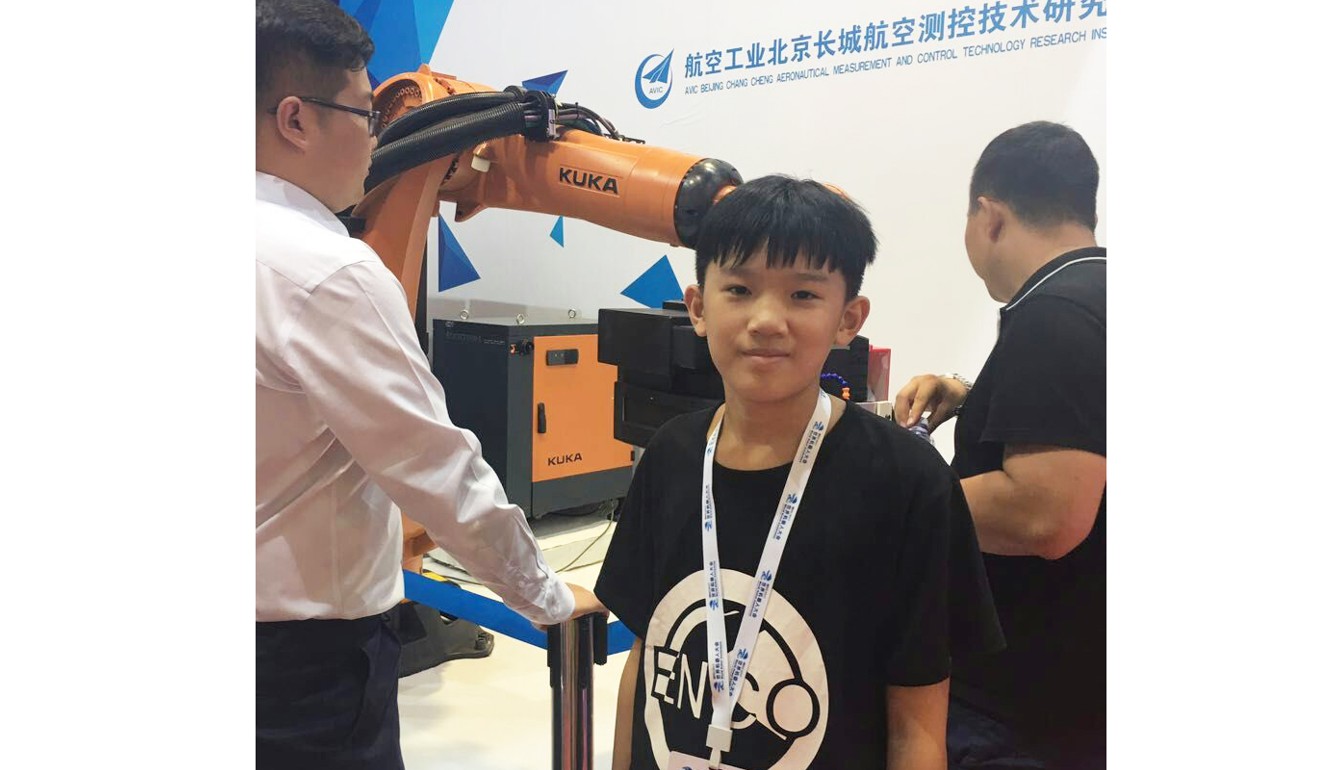 Zhang Hongwu at a Beijing robot programming camp this summer. The 12-year-old, who has been home-schooled by his father since age six, learned coding on his own. Photo: Handout