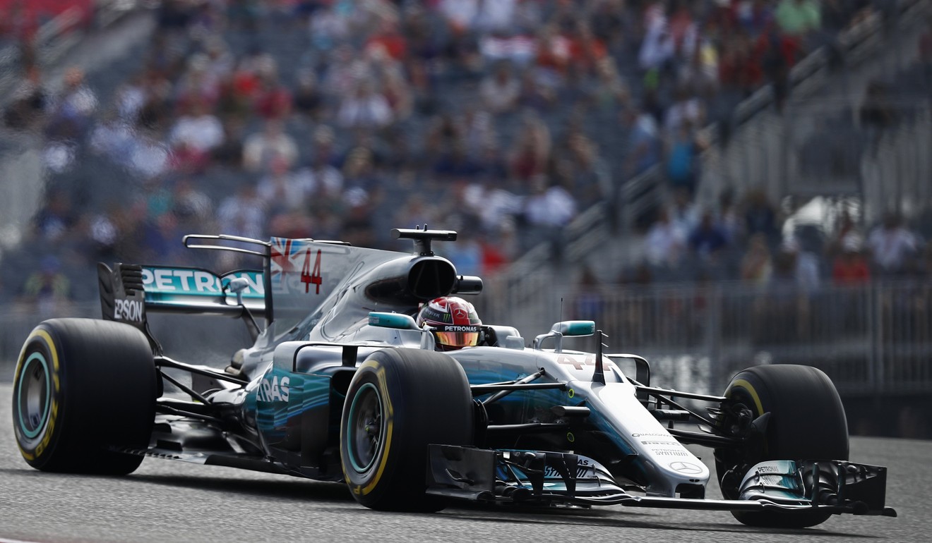 Lewis Hamilton comes around the turn during the second practice session. Photo: EPA