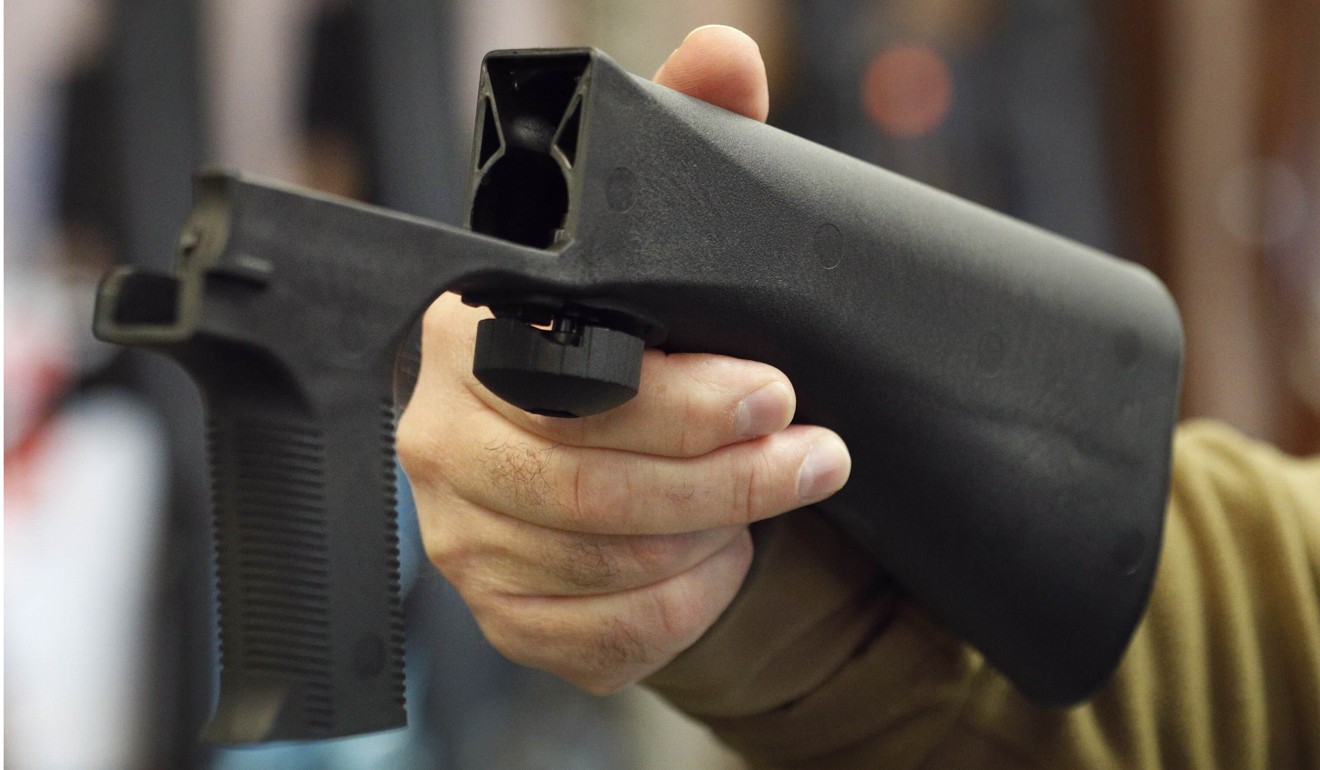A ‘bump stock’ device that fits onto a semi-automatic rifle to increase the firing speed, making it similar to a fully automatic rifle. Photo: AFP