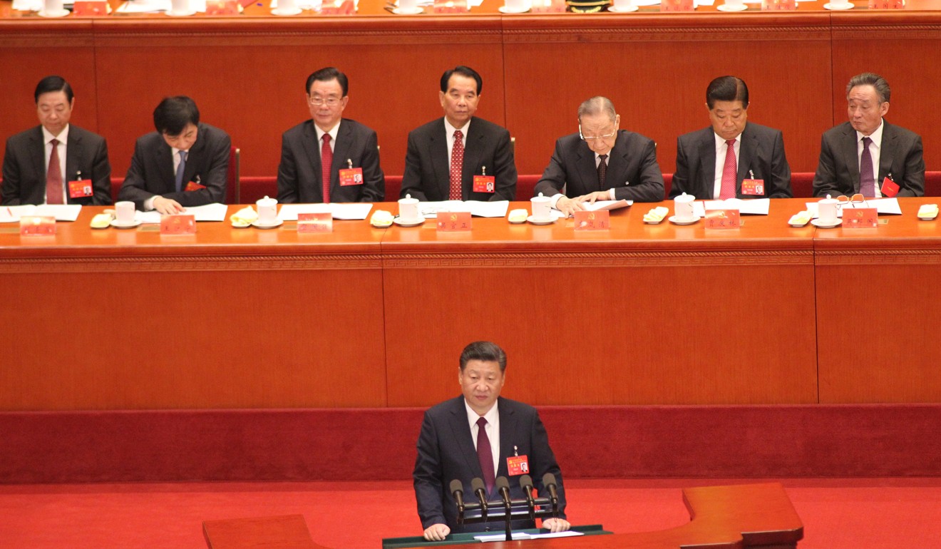 Delegates listen to Xi Jinping’s opening speech at the party conference on Wednesday . Photo SCMP/Simon Song