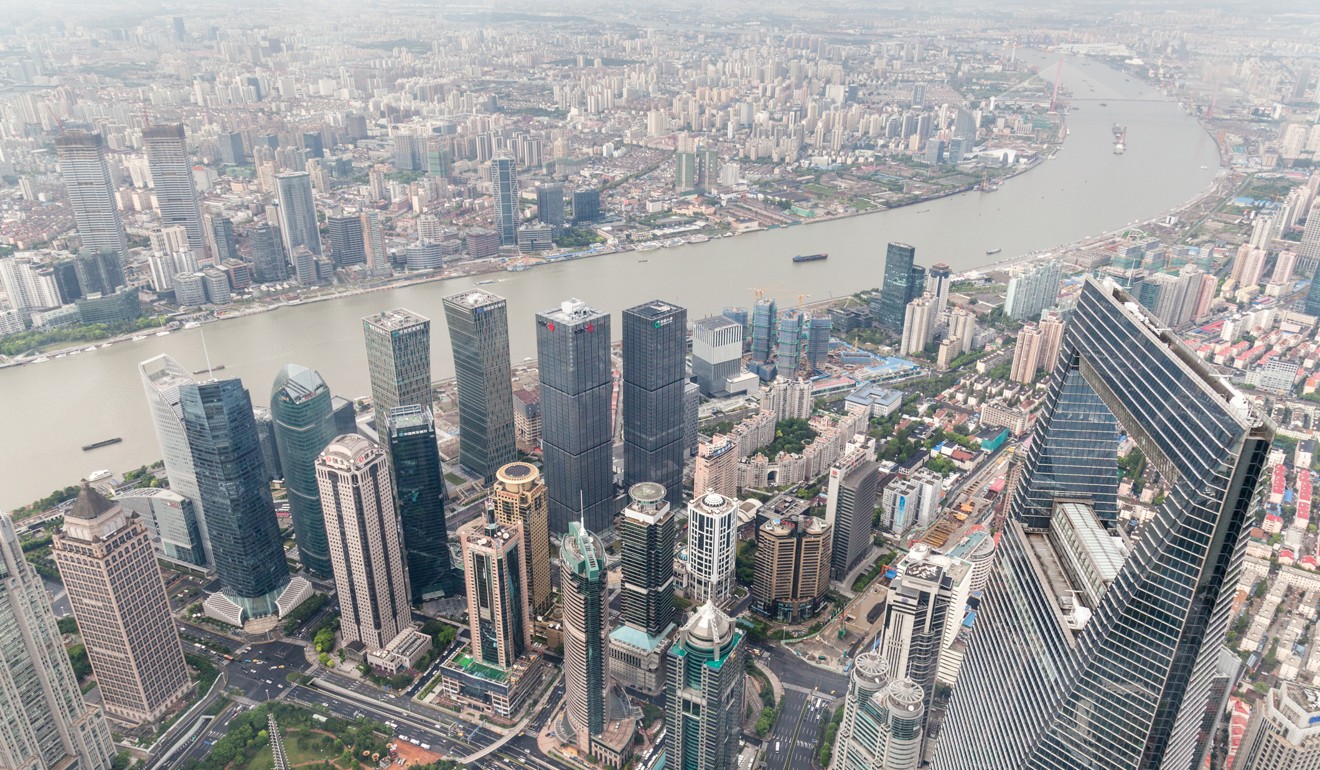 The view from the top of the Shanghai Tower, looking down onto the Shanghai World Financial Centre (right). Photo: Valerie Teh