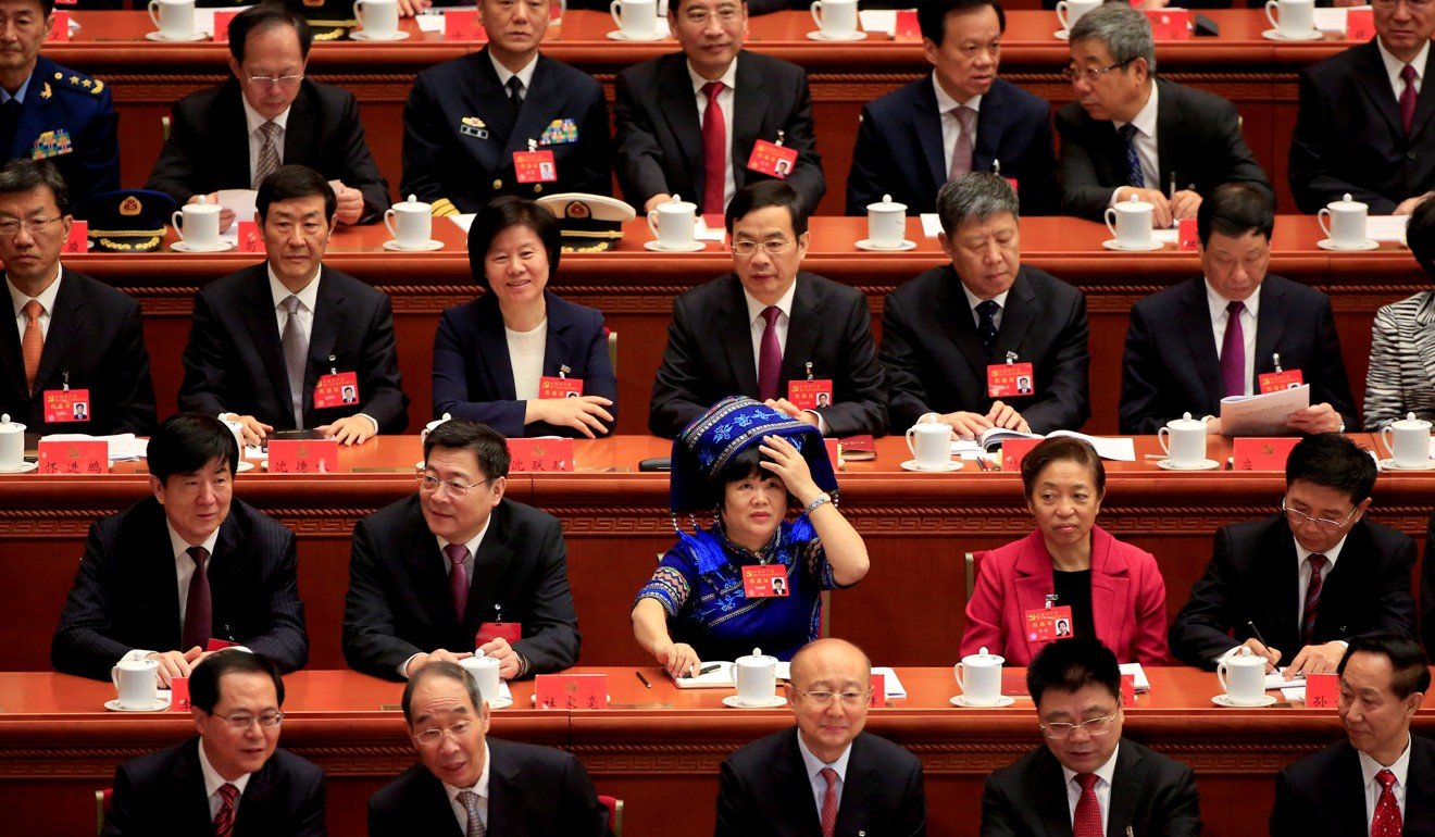 Delegates attend the opening session of the 19th party congress at the Great Hall of the People in Beijing on October 18. Photo: Reuters