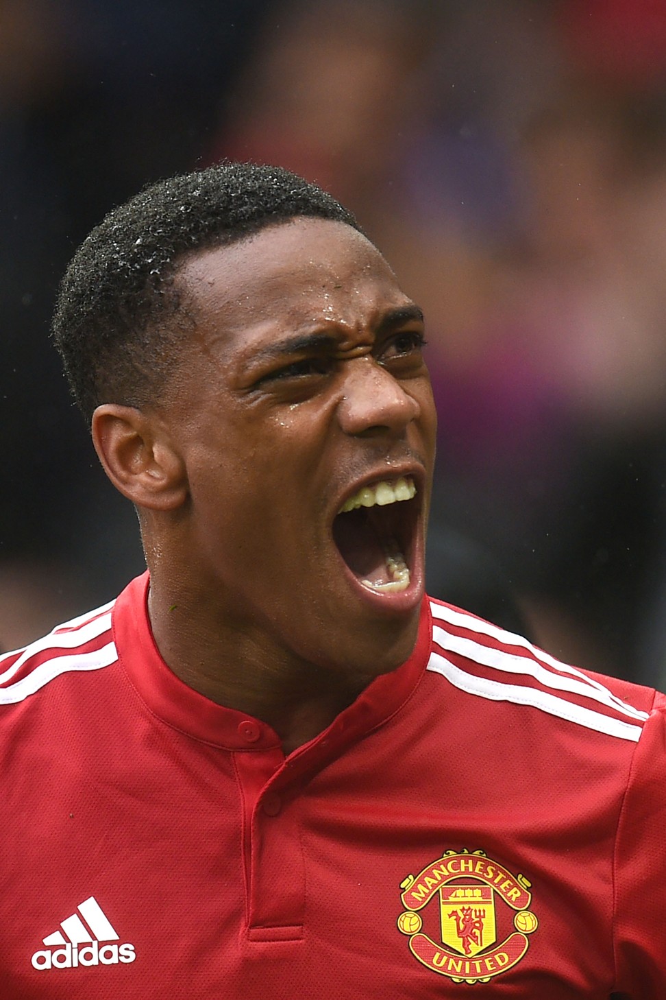 United's French striker Anthony Martial celebrates after scoring the opening goal. Photo: AFP