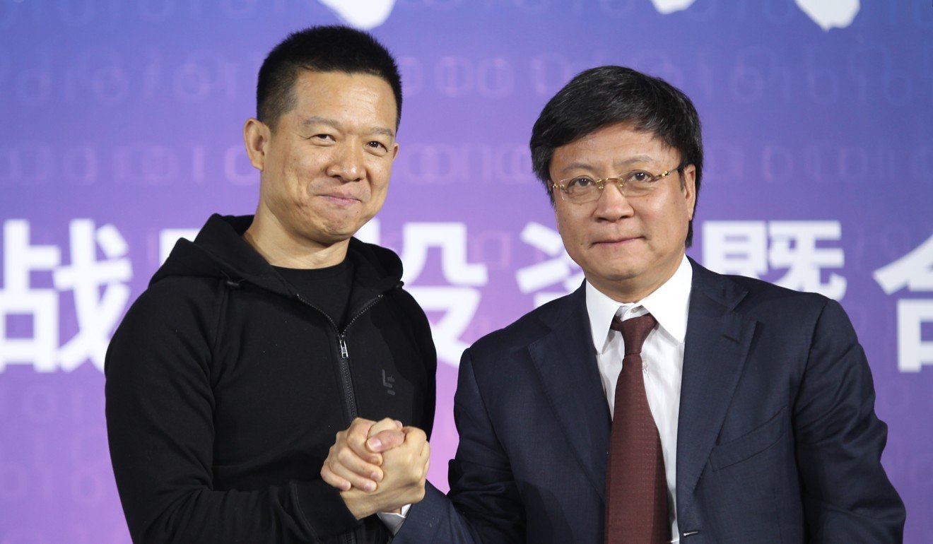 Jia Yueting (left), founder and chairman of LeEco, and Sun Hongbin announced their strategic investment cooperation in January. Photo: Simon Song