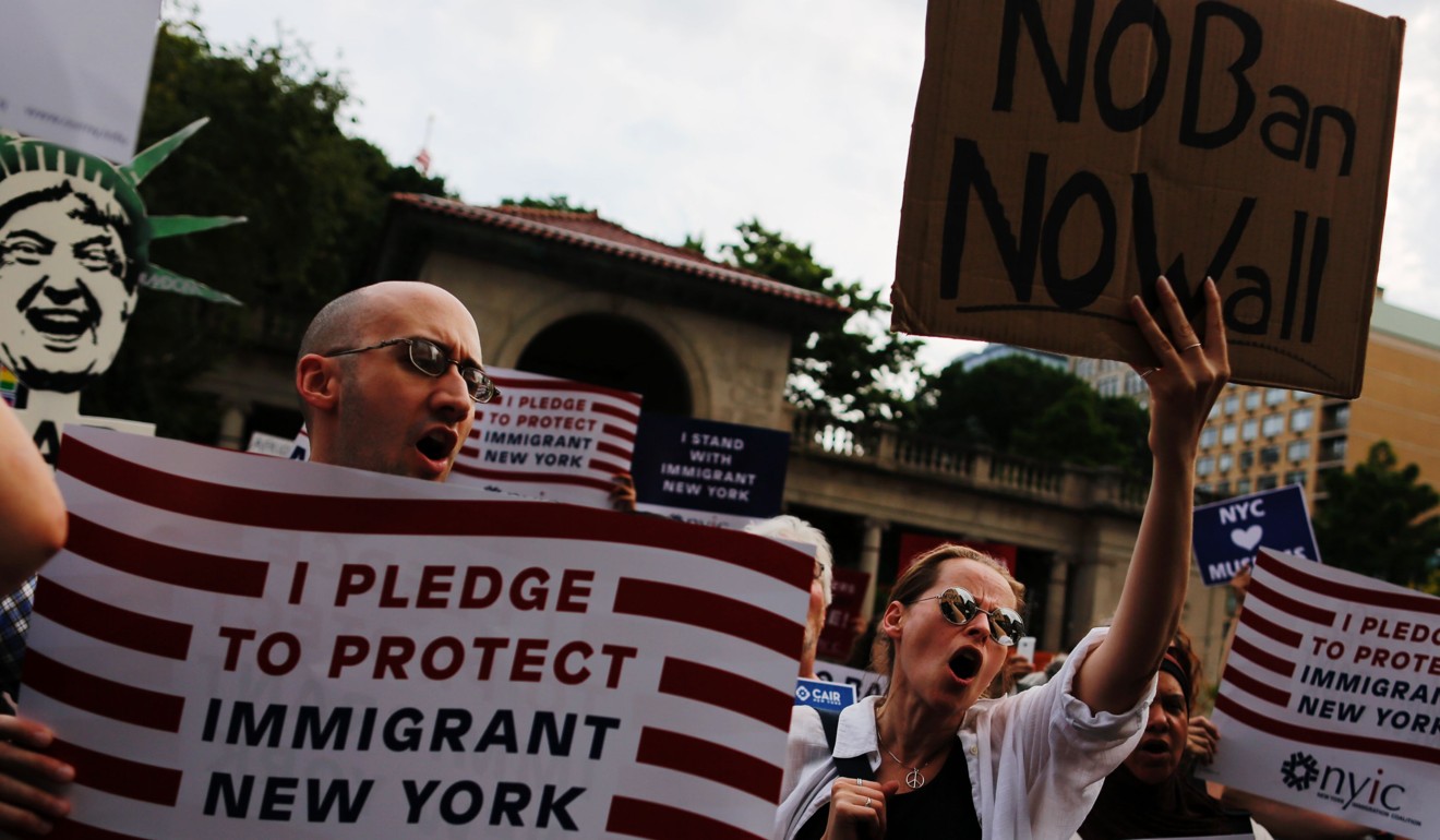 Protesters rally against restrictive guidelines relating to immigration and refugees under Donald Trump, in New York on June 29. Photo: AFP