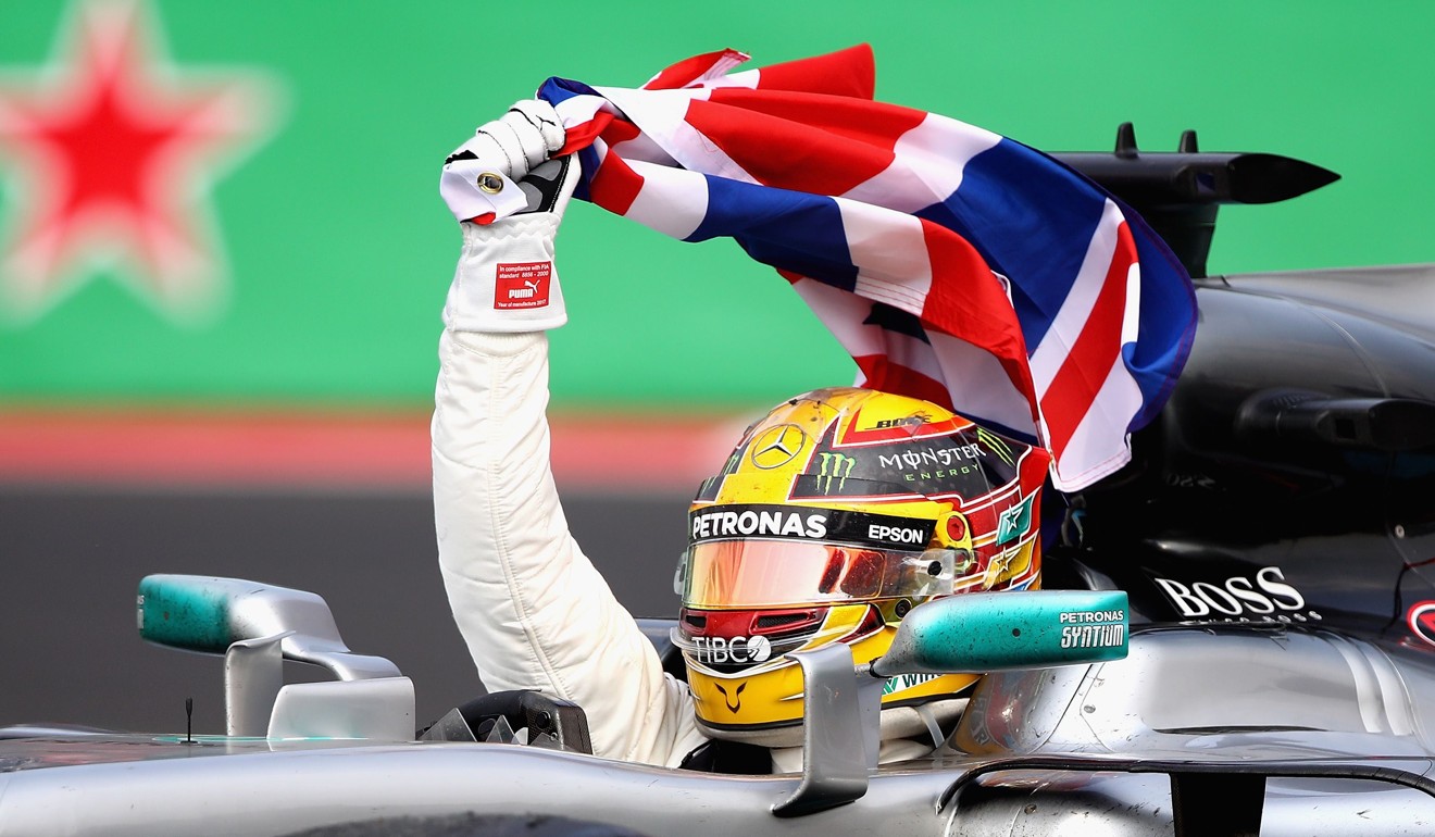 Lewis Hamilton on a victory lap. Photo: AFP