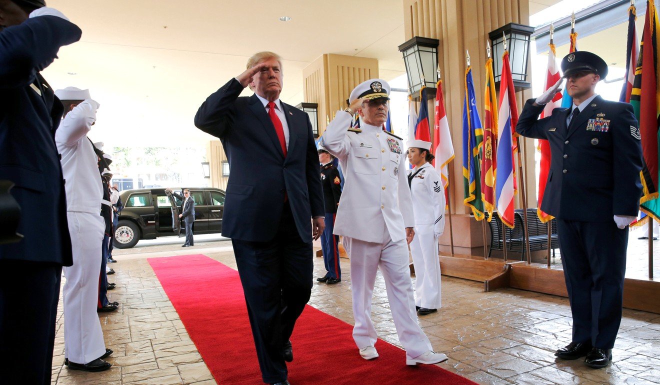 Trump is welcomed by US Navy Admiral Harry Harris, commander of United States Pacific Command, at its headquarters in Aiea, Hawaii. Photo: Reuters