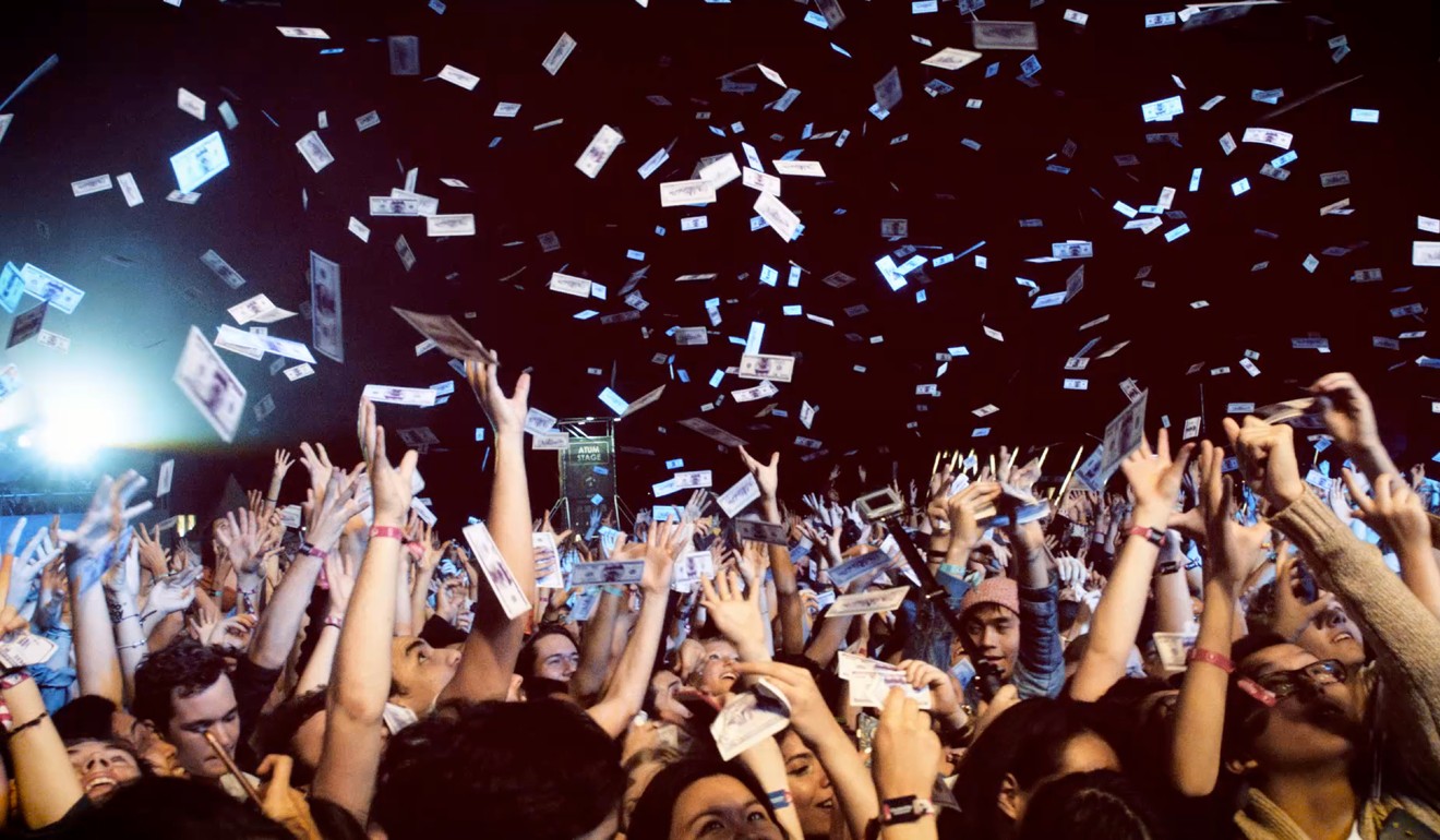 The cash confetti storm during A$AP Rocky’s set at Clockenflap. Photo Clockenflap