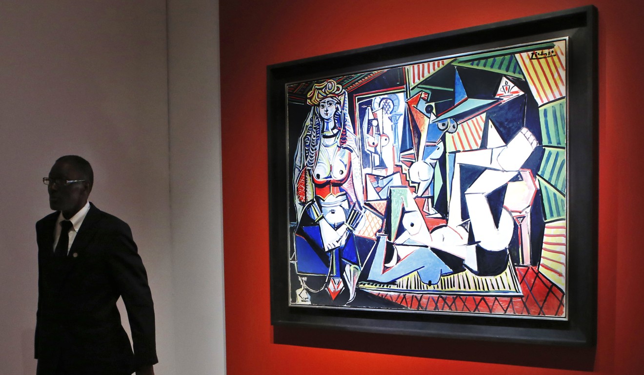 A security guard stands beside Pablo Picasso’s Women of Algiers (Version O) Christie’s Rockefeller Centre in New York. Photo: AP