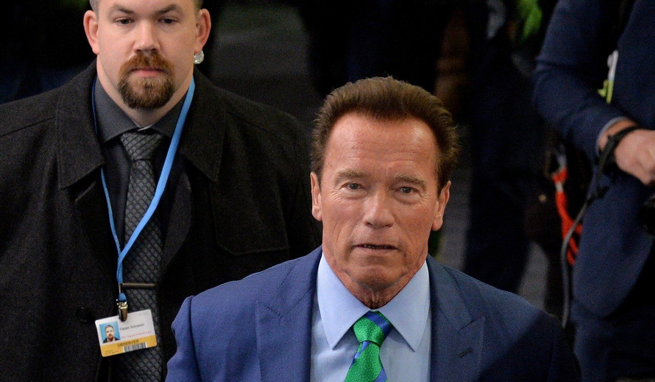 Former US governor of California Arnold Schwarzenegger arrives at the event in Bonn. Photo: EPA