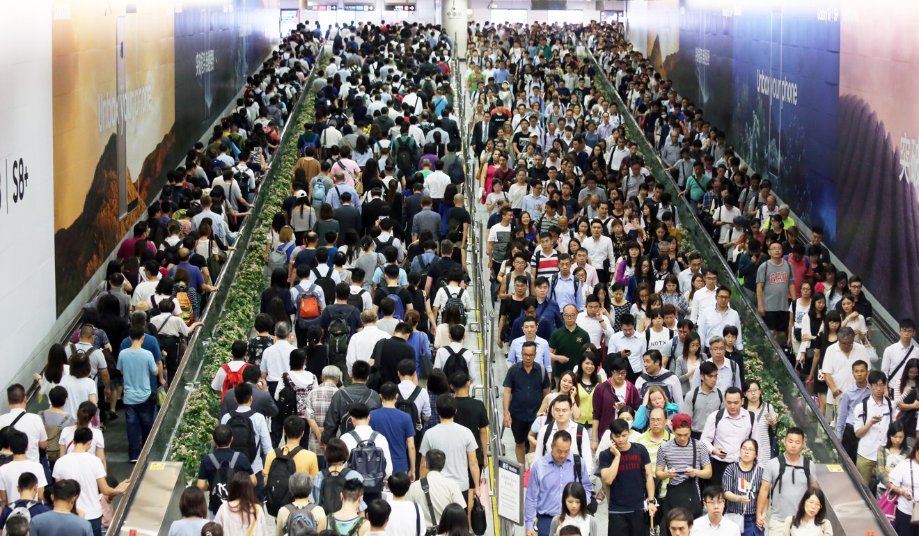 People rushing home at Cental MTR Station. Photo: Dickson Lee