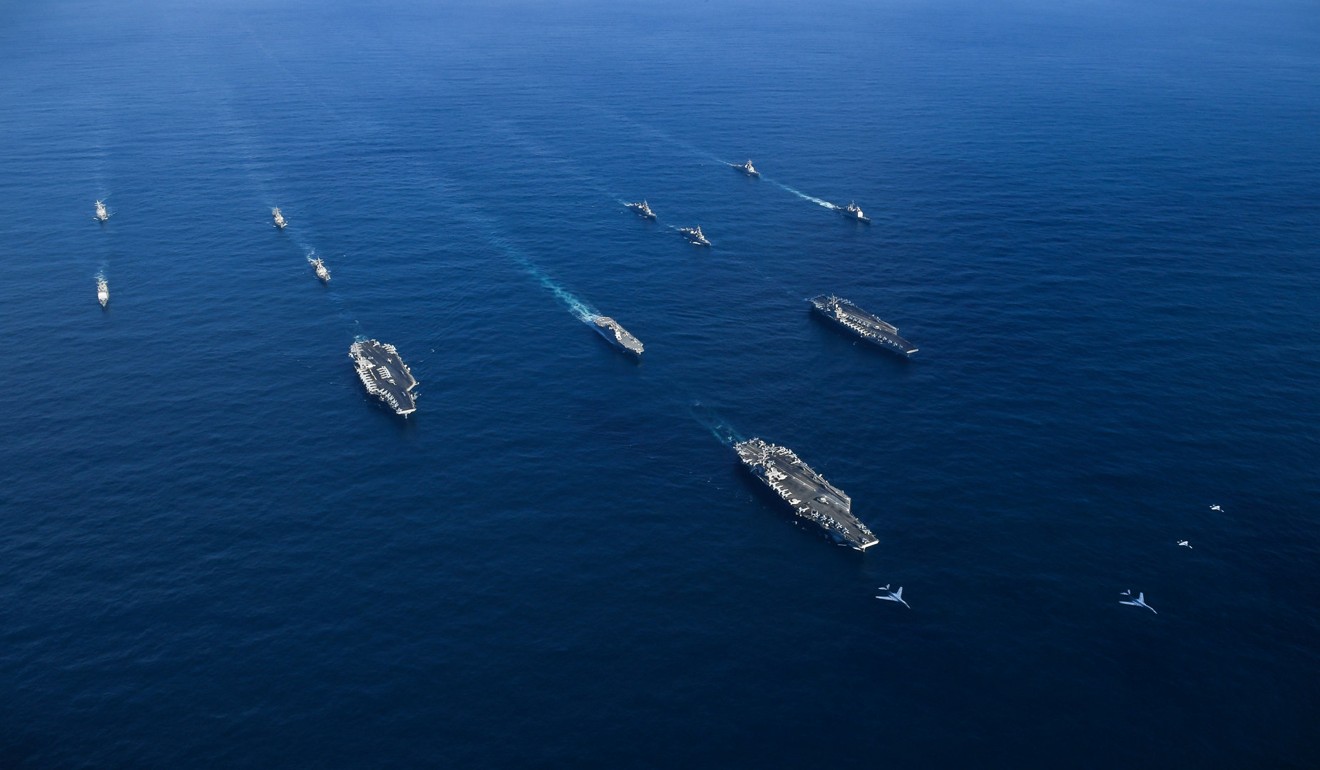 The USS Ronald Reagan, USS Theodore Roosevelt and USS Nimitz Strike Groups in the Western Pacific with ships from the Japanese Maritime Self-Defence Force. Photo: Reuters