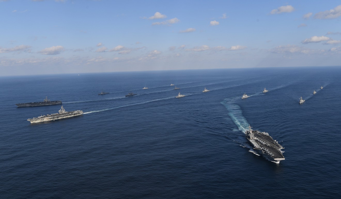 The USS Nimitz, USS Ronald Reagan and USS Theodore Roosevelt and South Korean destroyers during a naval drill off the east coast of South Korea on November 12, 2017. Photo: EPA