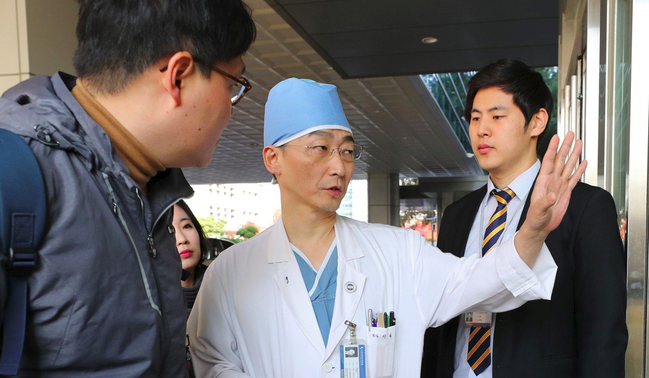 South Korean doctor Lee Cook-jong, who carried out surgery on gunshot wounds sustained by a North Korean soldier, speaks to journalists at Ajou University Hospital in Suwon, south of Seoul. Photo: Agence France-Presse