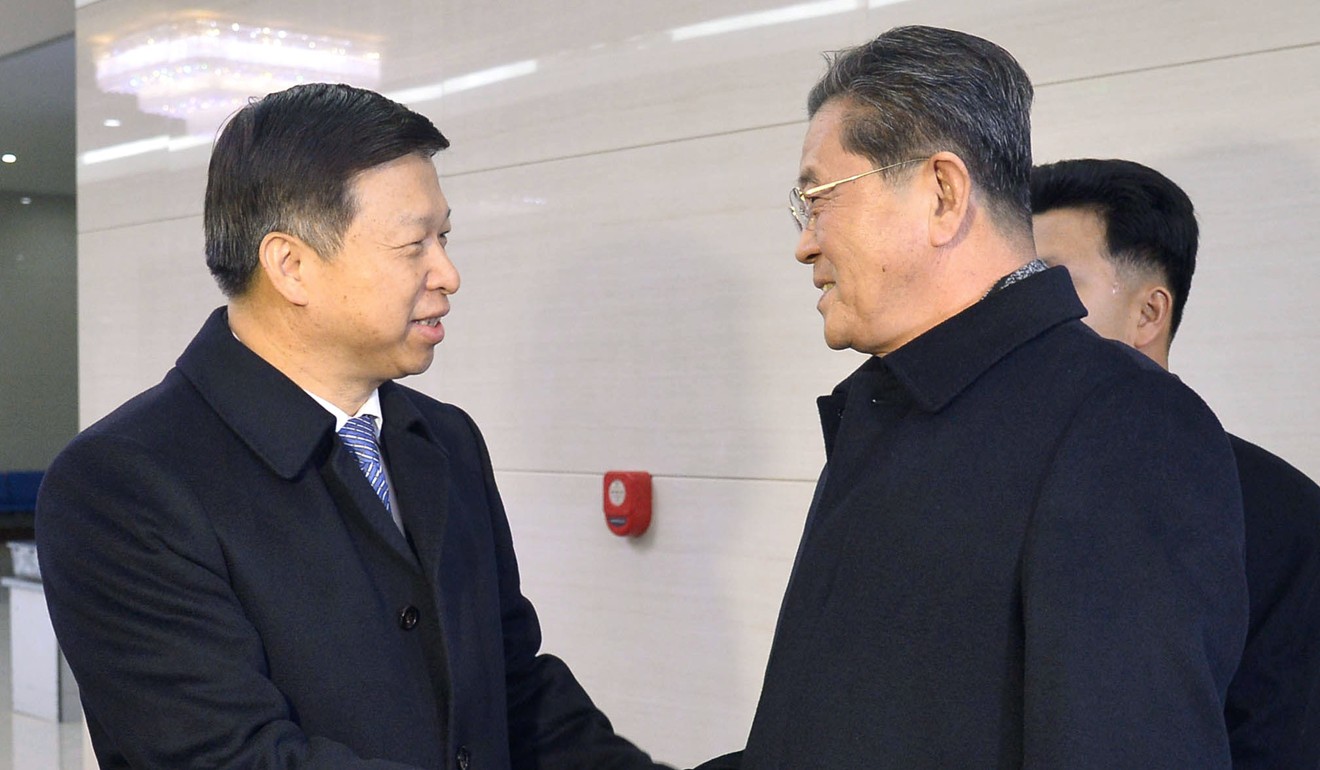 Song Tao (left), the head of the Chinese Communist Party's international liaison department, pictured with Ri Chang-gun, the vice -director of the Central Committee of North Korea's ruling party at Pyongyang International Airport on Friday. Photo: Kyodo