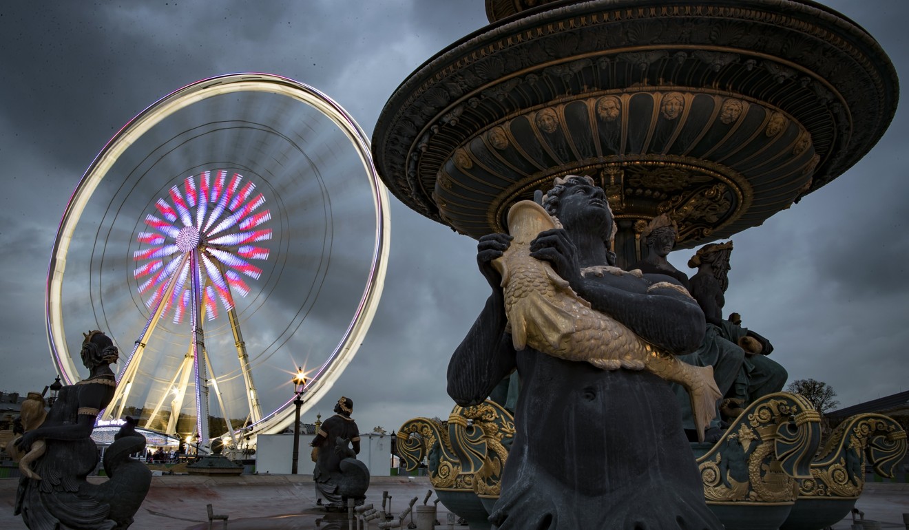 The Ferris whee set up on Paris' renowned Place de la Concorde over the winter months since 2000, has prompted strong debate. Photo: EPA