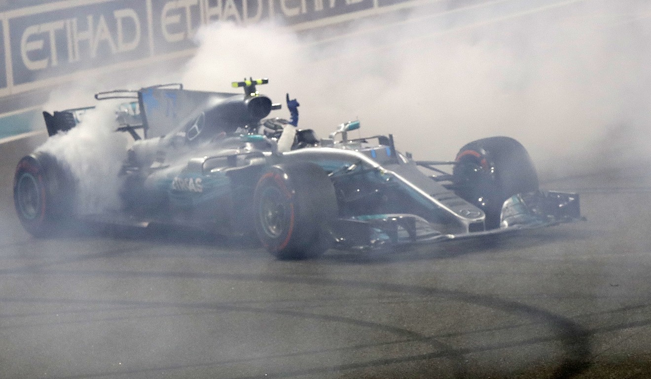 Mercedes driver Valtteri Bottas of Finland celebrates winning the Abu Dhabi Grand Prix. Photo: AP
