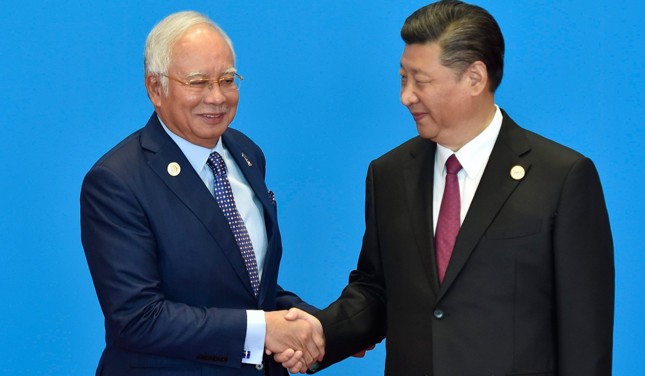 Malaysia's Prime Minister Najib Razak with Chinese President Xi Jinping. Photo: AFP
