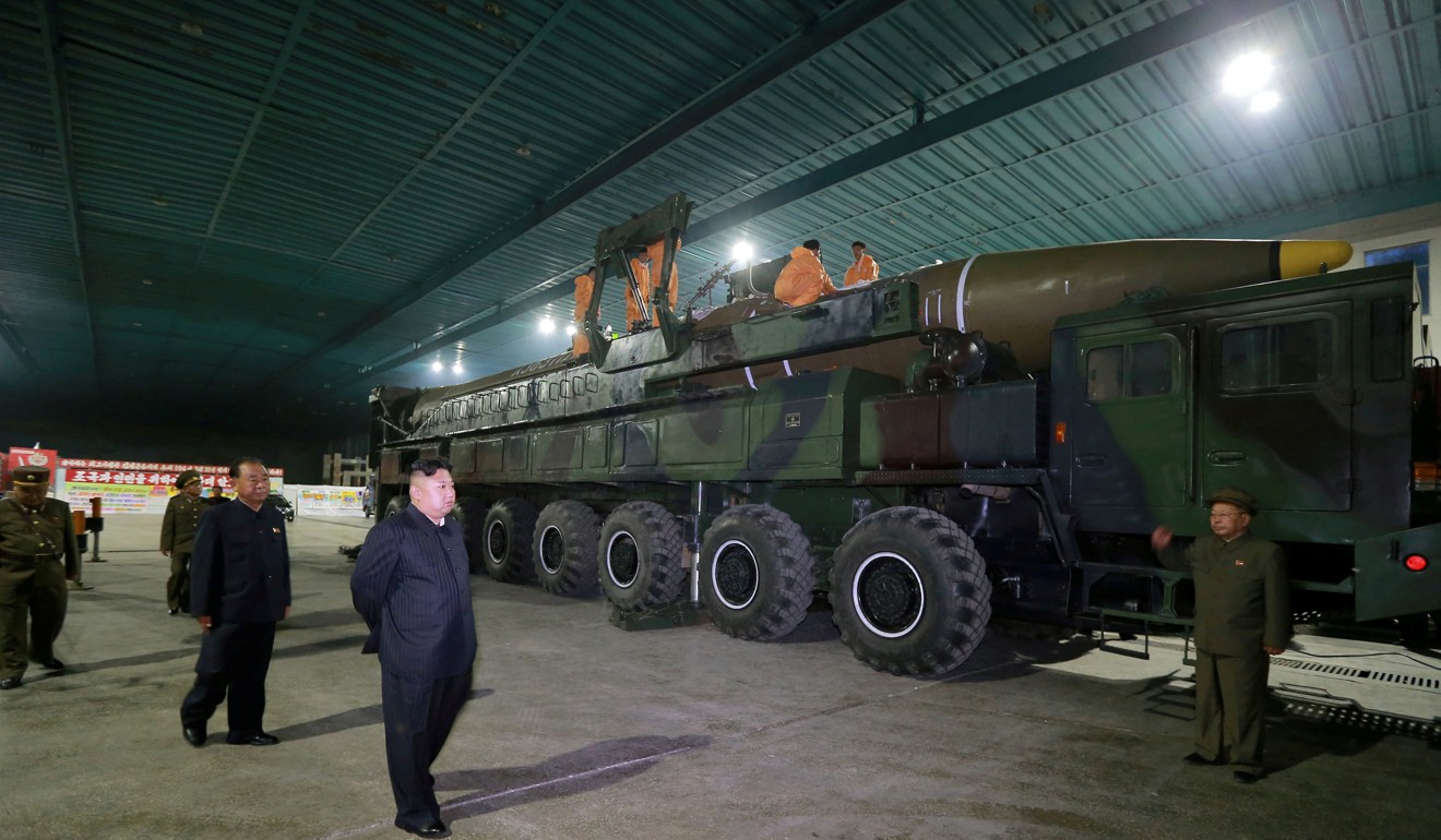 North Korean leader Kim Jong-un inspects a Hwasong-14 missile. File photo: Reuters