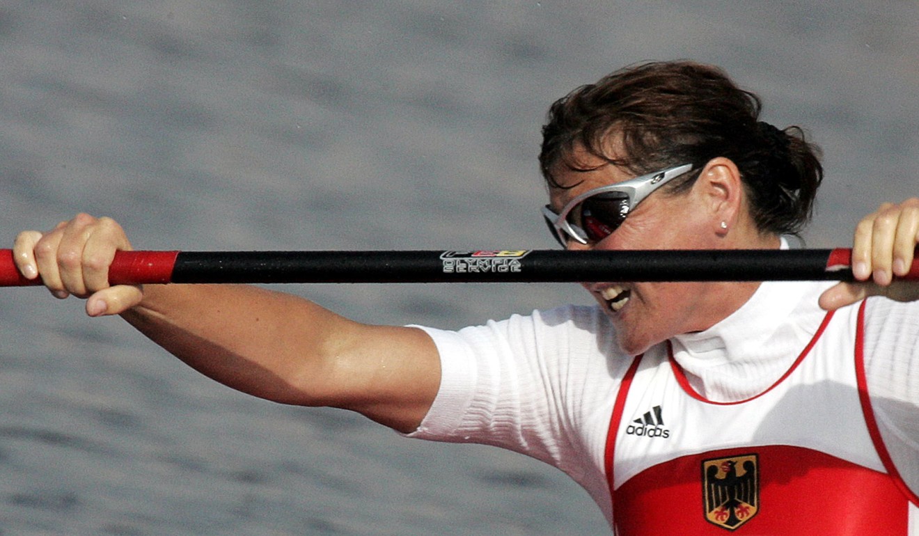 German Birgit Fischer races to finish first in the Women's K4 500m final at the Athens Olympics in 2004. Photo: AFP