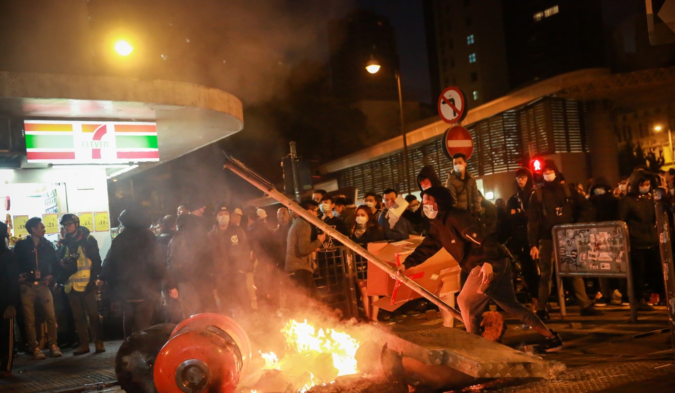 Riots in Mong Kok in February 2016. Rioters set fires and threw bricks at police, injuring officers and shuttering one of the city's busiest subway stations. Photo: Bloomberg