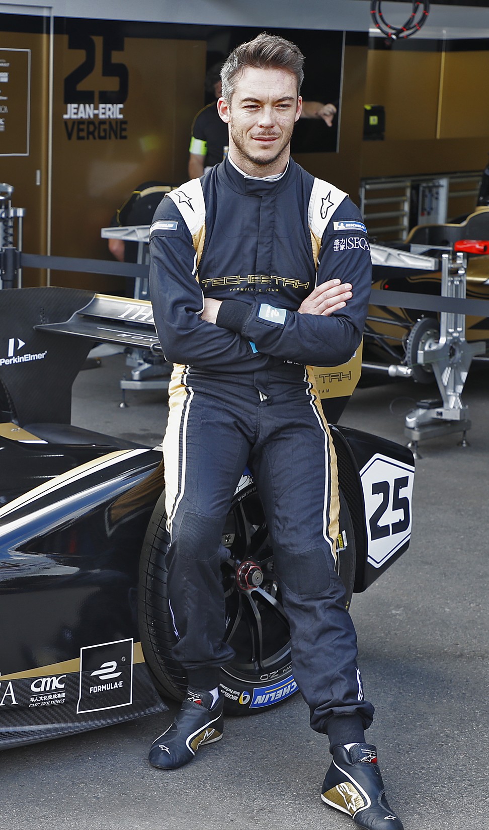 Formula E driver Andre Lotterer in front of the new Techeetah car. Photo: Edward Wong