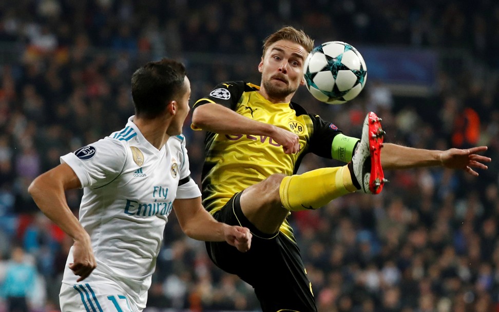 Borussia Dortmund’s Marcel Schmelzer in action with Real Madrid’s Lucas Vazquez. Photo: Reuters