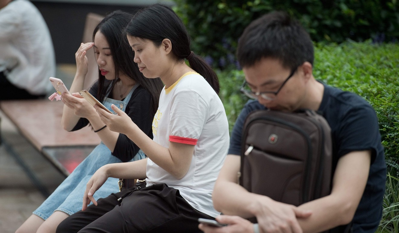 There are 1.2 billion mobile phone users in China. Photo: AFP