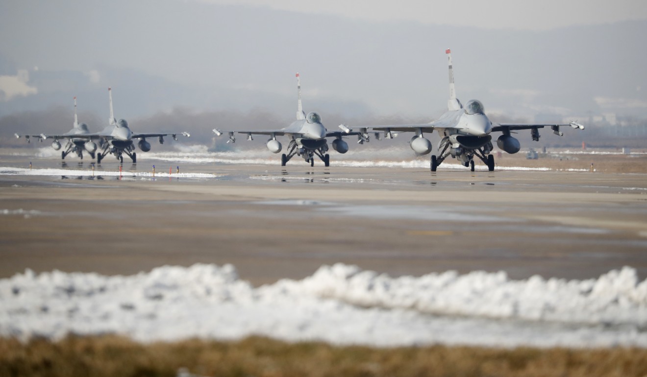 US Air Force F-16 fighter jets take part in a joint aerial drills called Vigilant Ace between the US and South Korea at the Osan Air Base in Pyeongtaek, South Korea. Photo: Pool via AP