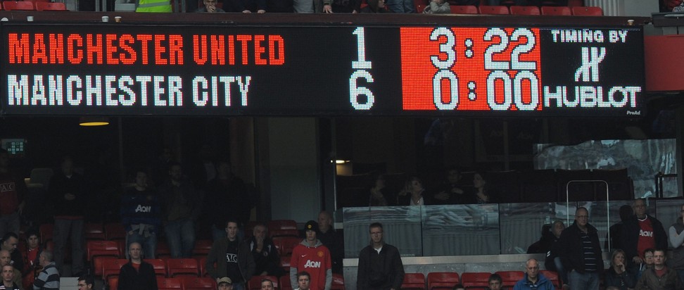 The Old Trafford scoreboard shows the result of the October 2011 Manchester derby. City went on to win the league by goal difference. Photo: AFP