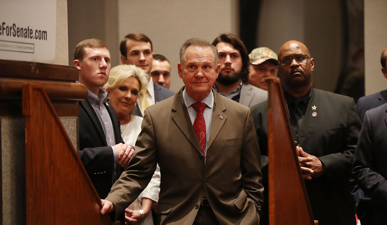 Republican Senatorial candidate Roy Moore waits to be introduced to speak in Montgomery, Alabama. Photo: Agence France-Presse