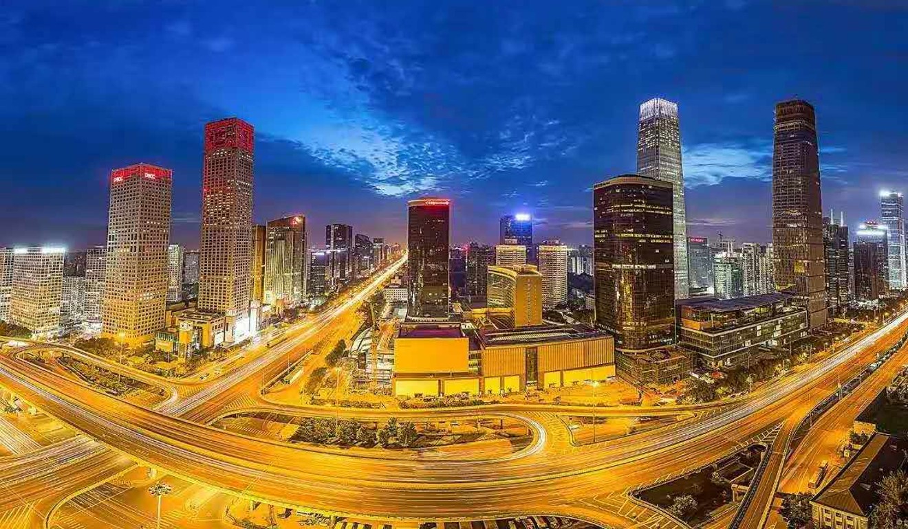 Rooftopping photographer Wang Xinchao aims to bring out the beauty of Beijing’s skyline. Photo: Wang Xinchao