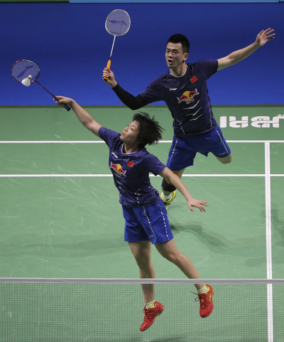 China's Siwei Zheng (right) and Qingchen Chen return a shot during the final. Photo: AP