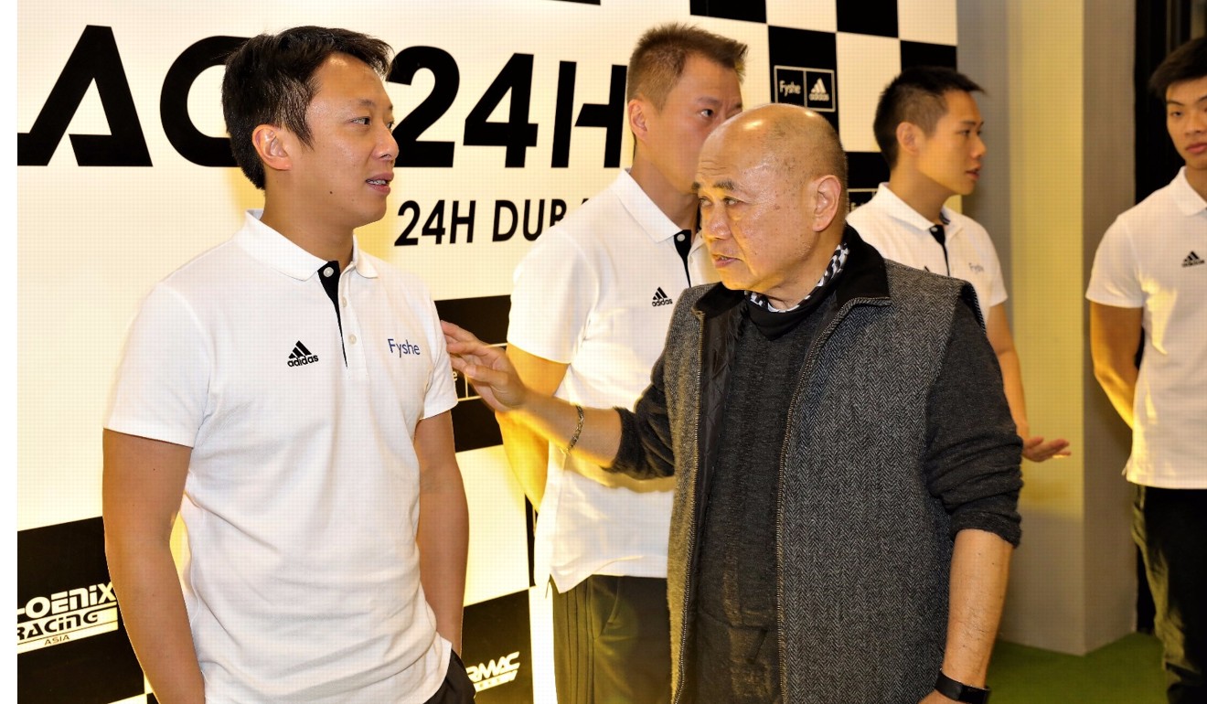 Lawrence Yu, governor of Hong Kong Automobile Association (right) chats with Marchy Lee.