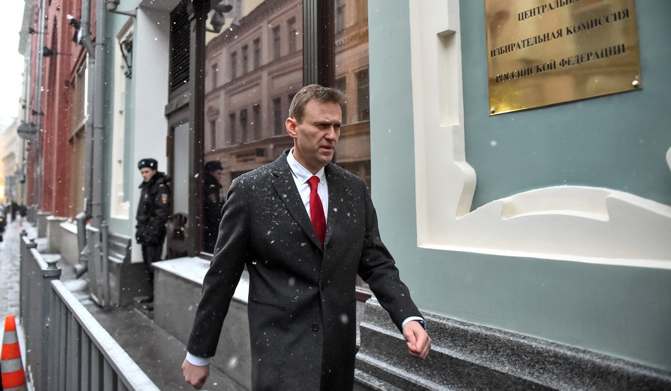 Russian opposition leader Alexei Navalny entering the headquarters of the Central Election Commission in Moscow on December 25, 2017. Photo: AFP