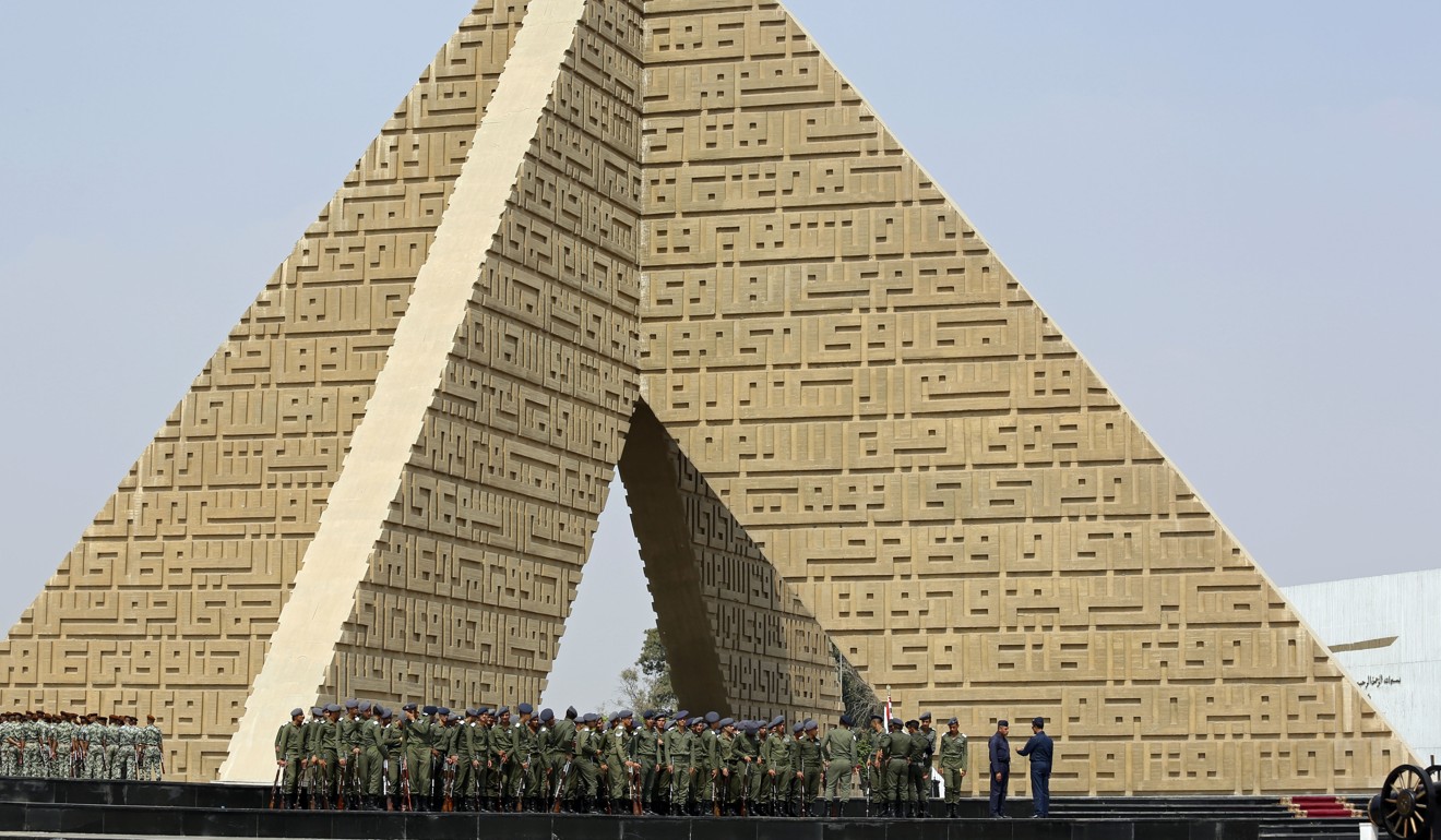 Egyptian soldiers in 2013 gather at the Tomb of the Unknown Soldier and President Anwar Sadat's memorial in the run-up to celebrations marking the 40th anniversary of the start of the 1973 Middle East war. Photo: AP