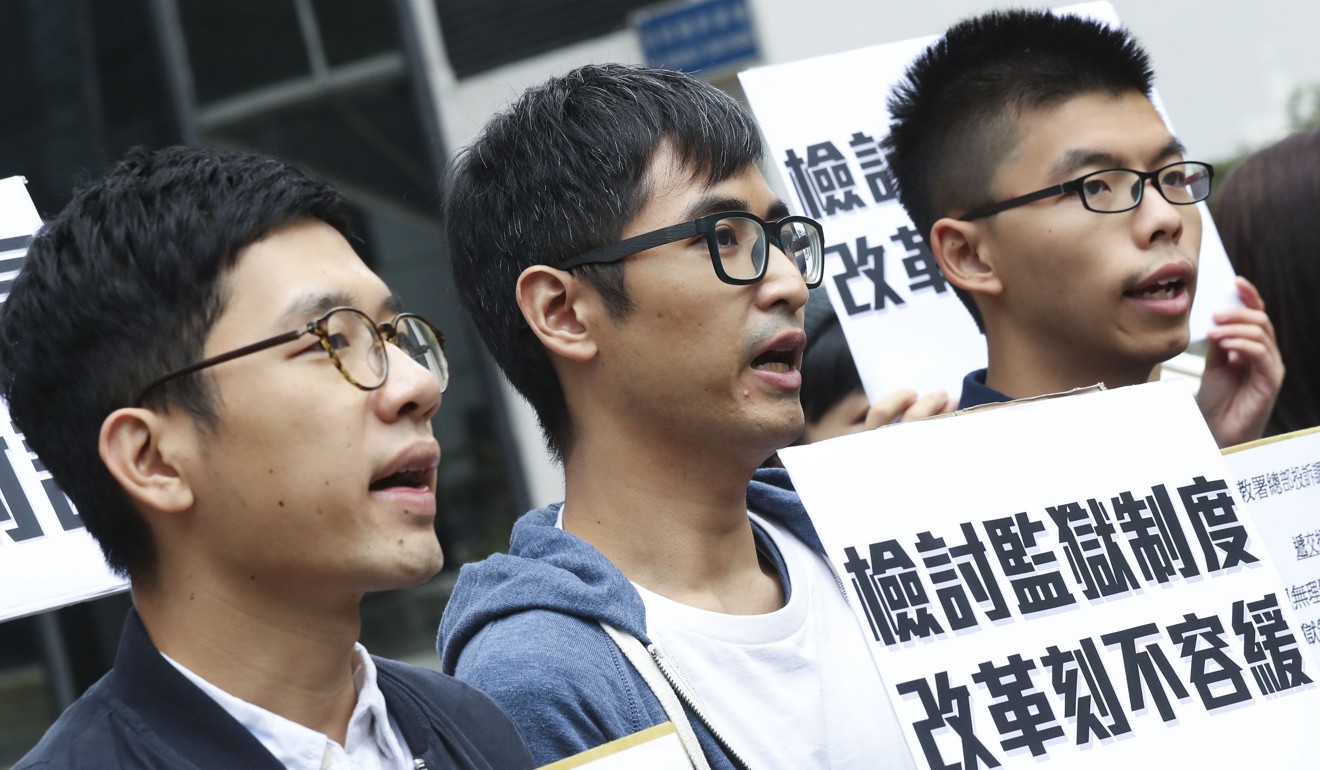 (From left) Nathan Law Kwun-chung, Alex Chow Yong-kang and Joshua Wong Chi-fung file a complaint to the Correctional Services Department over their treatment while in custody. Photo: K.Y. Cheng