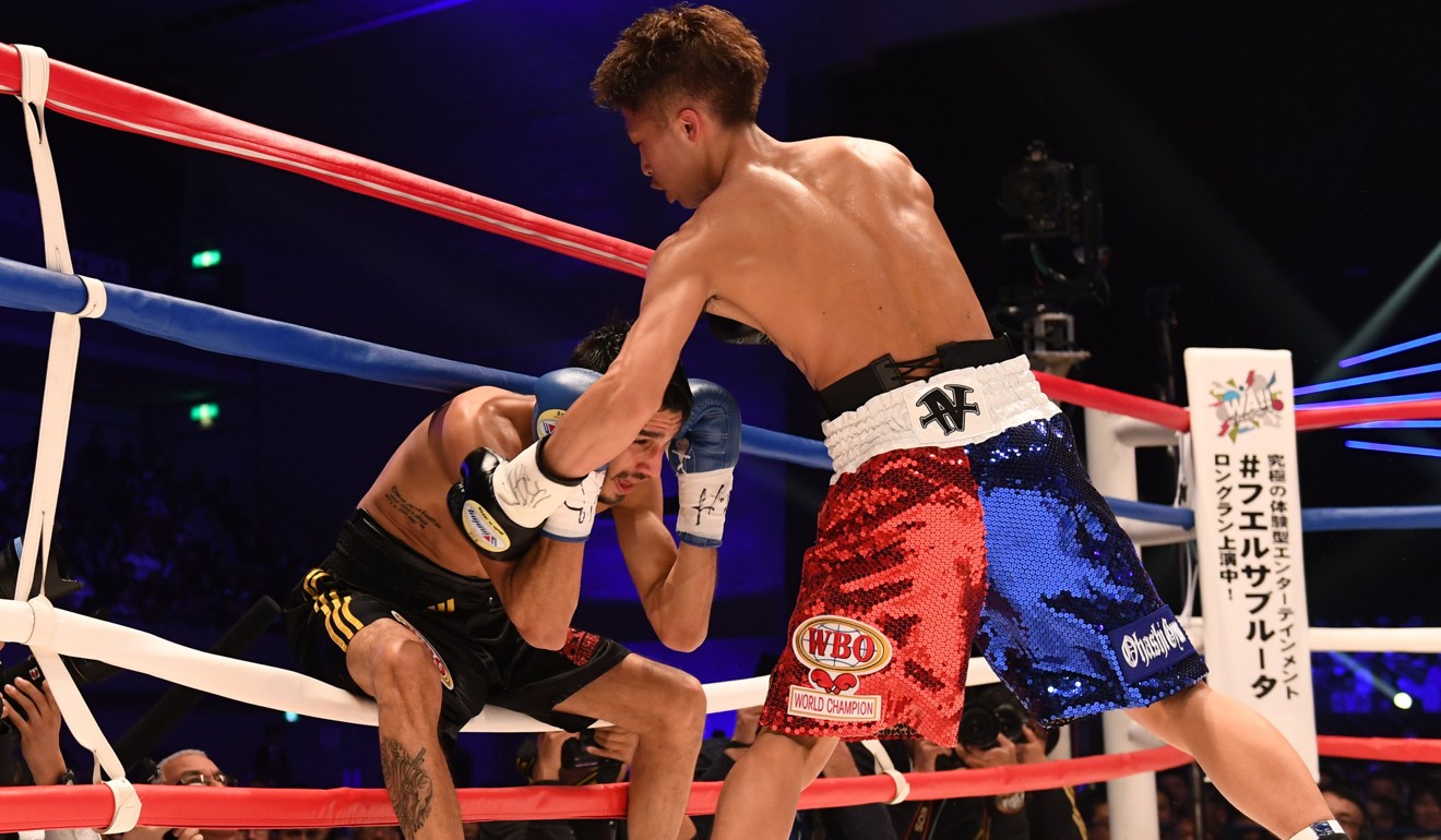 Frenchman Yoan Boyeaux is against the ropes against Naoya Inoue in Yokohama. Photo: AFP