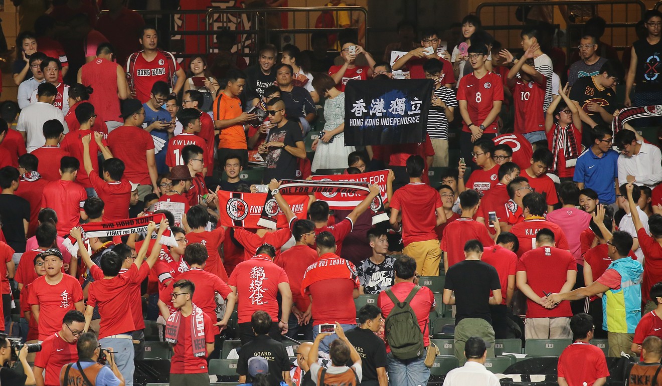 Hong Kong football fans continued to boo and turn their backs when the national anthem was played at soccer matches. Photo: Dickson Lee