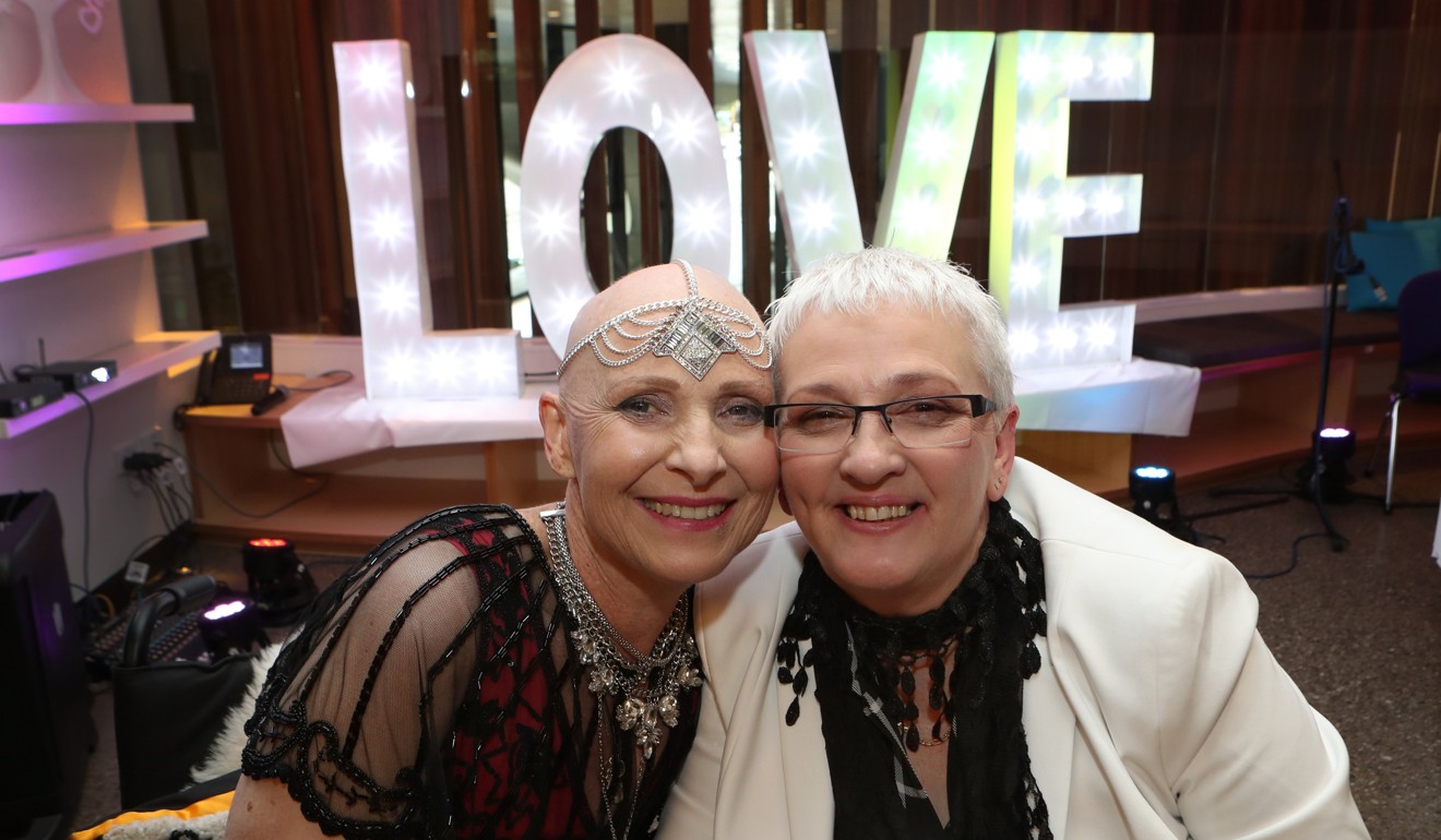 Cas Willow and her long-term partner Heather Richards at their marriage ceremony at the Peter MacCallum Cancer Centre in Melbourne. Photo: EPA