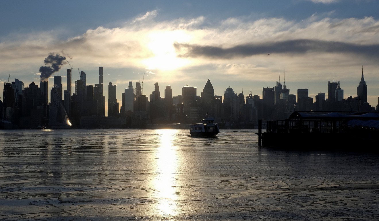 For Deng, who had only known two cities, the offer of admission from the prestigious School for Visual Arts in New York was a dream come true. Pictured: Ice coats the Hudson River near the US city. Photo: Reuters