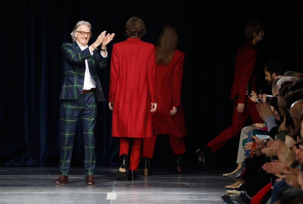 British designer Paul Smith acknowledges the audience during men’s Fashion Week in Paris. Photo: AFP