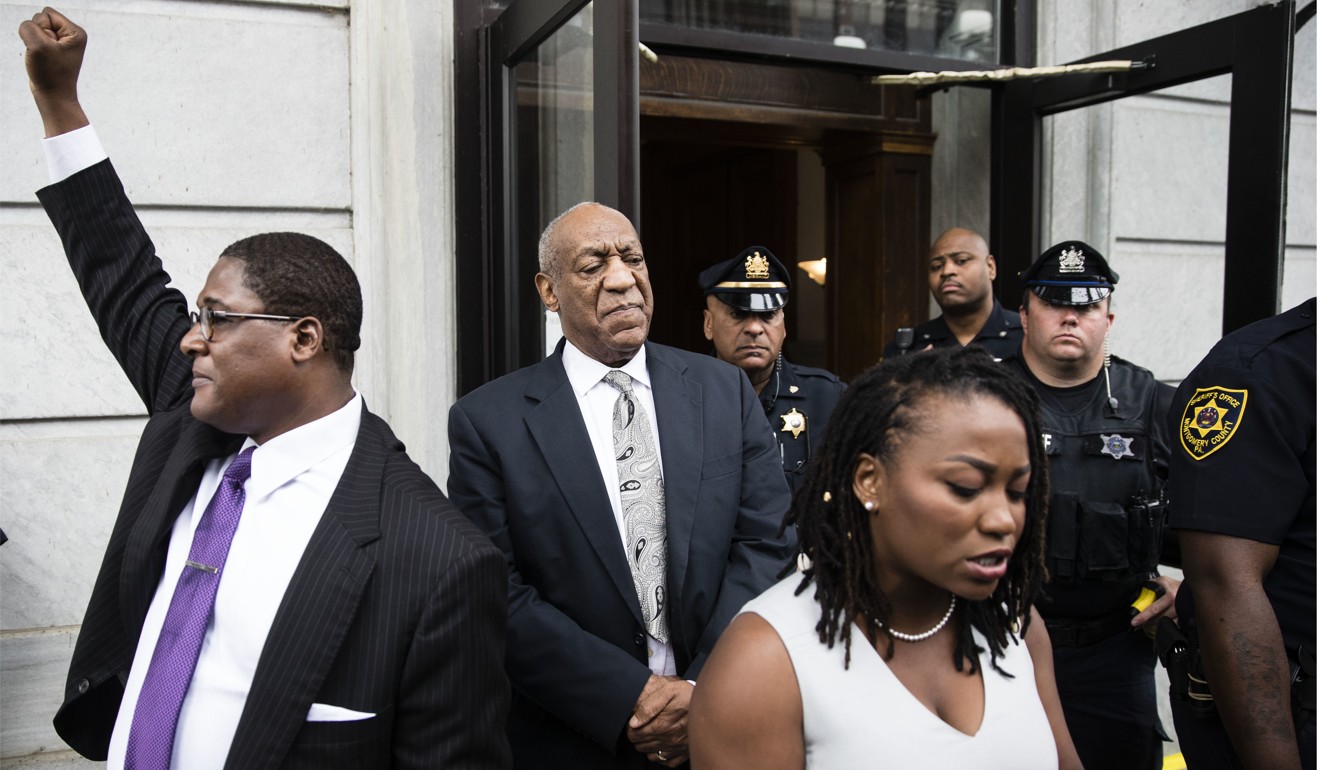 Bill Cosby listens to his wife Camille's statement being read aloud by Ebonee M Benson outside the Montgomery County Courthouse after a mistrial in his sexual assault case on June 17, 2017. Photo: AP