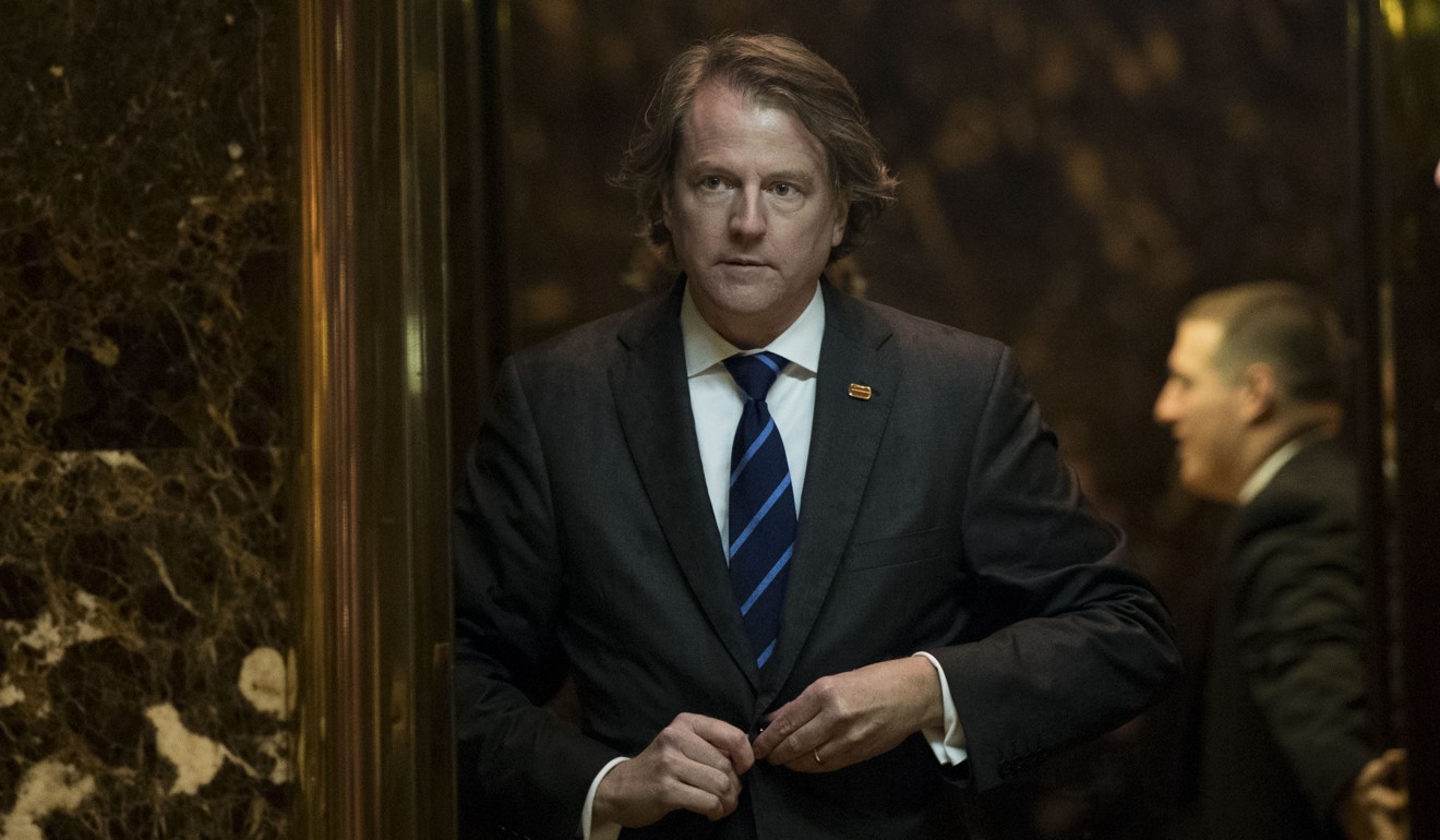 Don McGahn, then general counsel for the Trump transition team, getting into a lift in the lobby at Trump Tower in New York. Photo: AFP