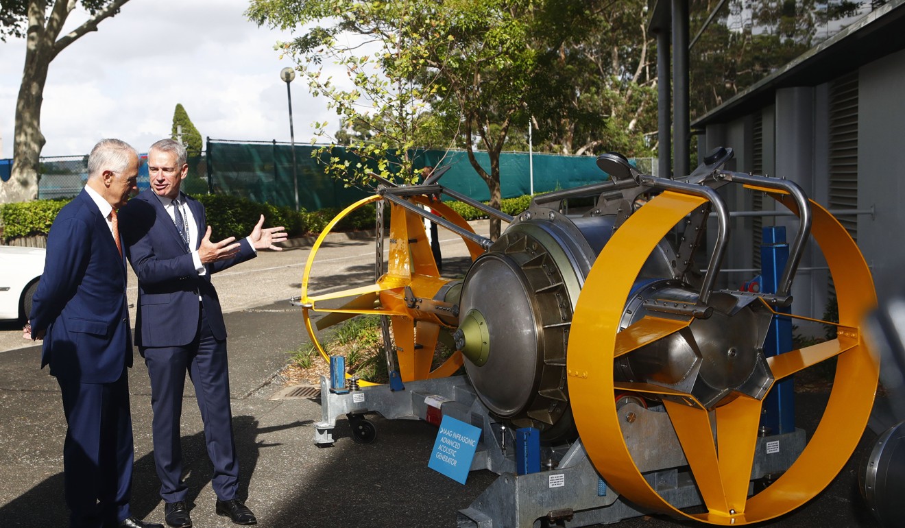 Australian Prime Minister Malcolm Turnbull and Thales CEO Chris Jenkins at the Thales Underwater Systems facility in Sydney. Photo: EPA