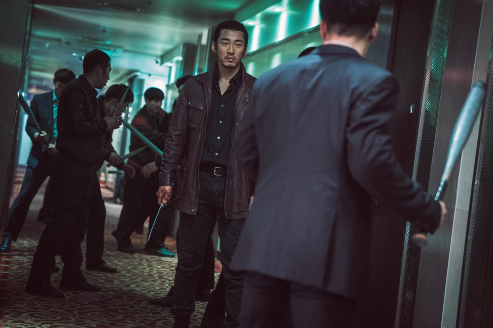 Yoon Kye-sang (centre) plays the leader of the Black Dragons in The Outlaws.