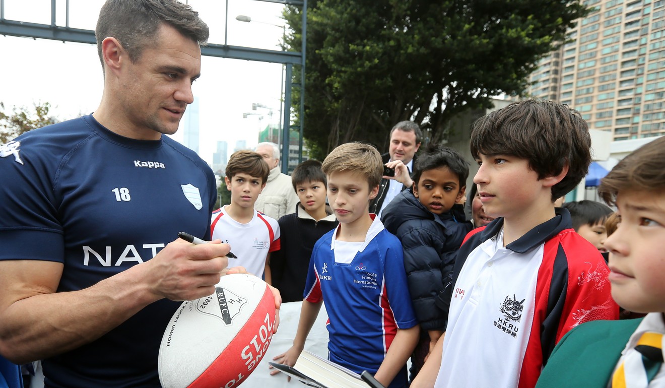 Dan Carter signs autographs for fans in Hong Kong. Photo: Dickson Lee