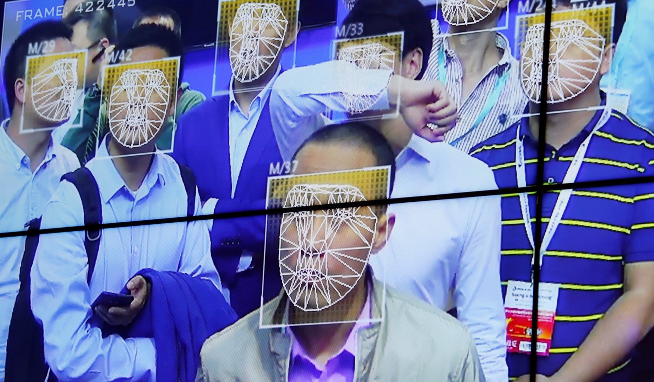 Visitors experience facial recognition technology at the China Public Security Expo in Shenzhen in October. Photo: Reuters