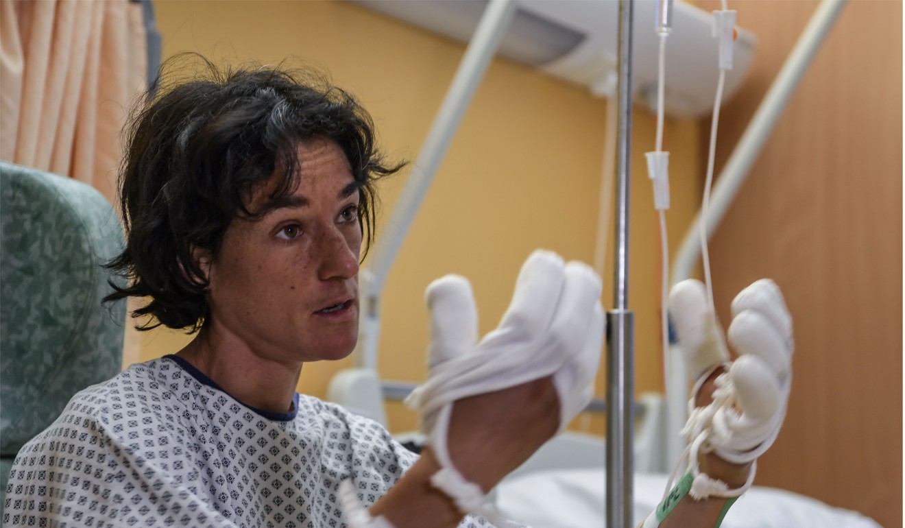 Revol talks to journalists on Wednesday at the hospital in Sallanches French Alps after her rescue. She suffered frostbite on her hands and feet, and may have to undergo amputations. Photo: AFP