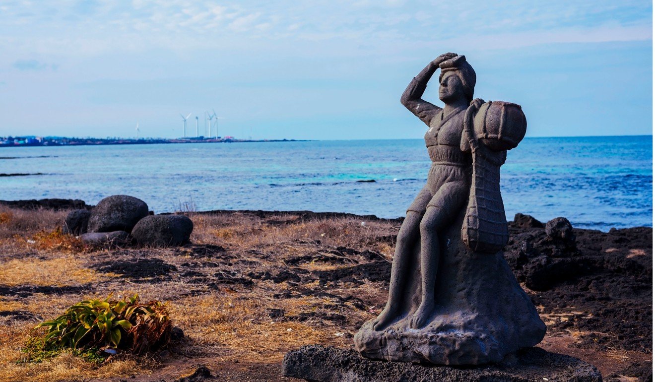 A statue dedicated to haenyeo divers on Jeju.